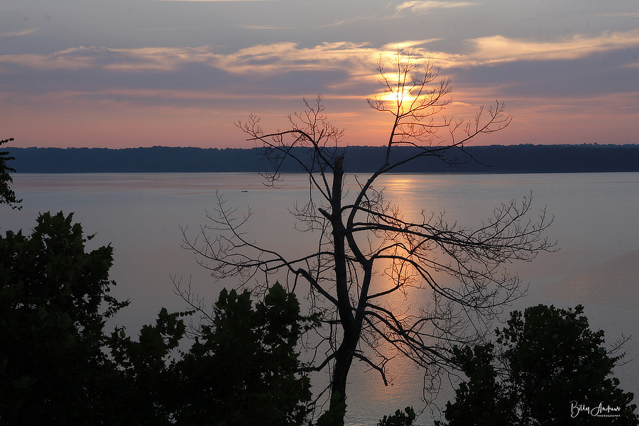 three people sitting on RV porch